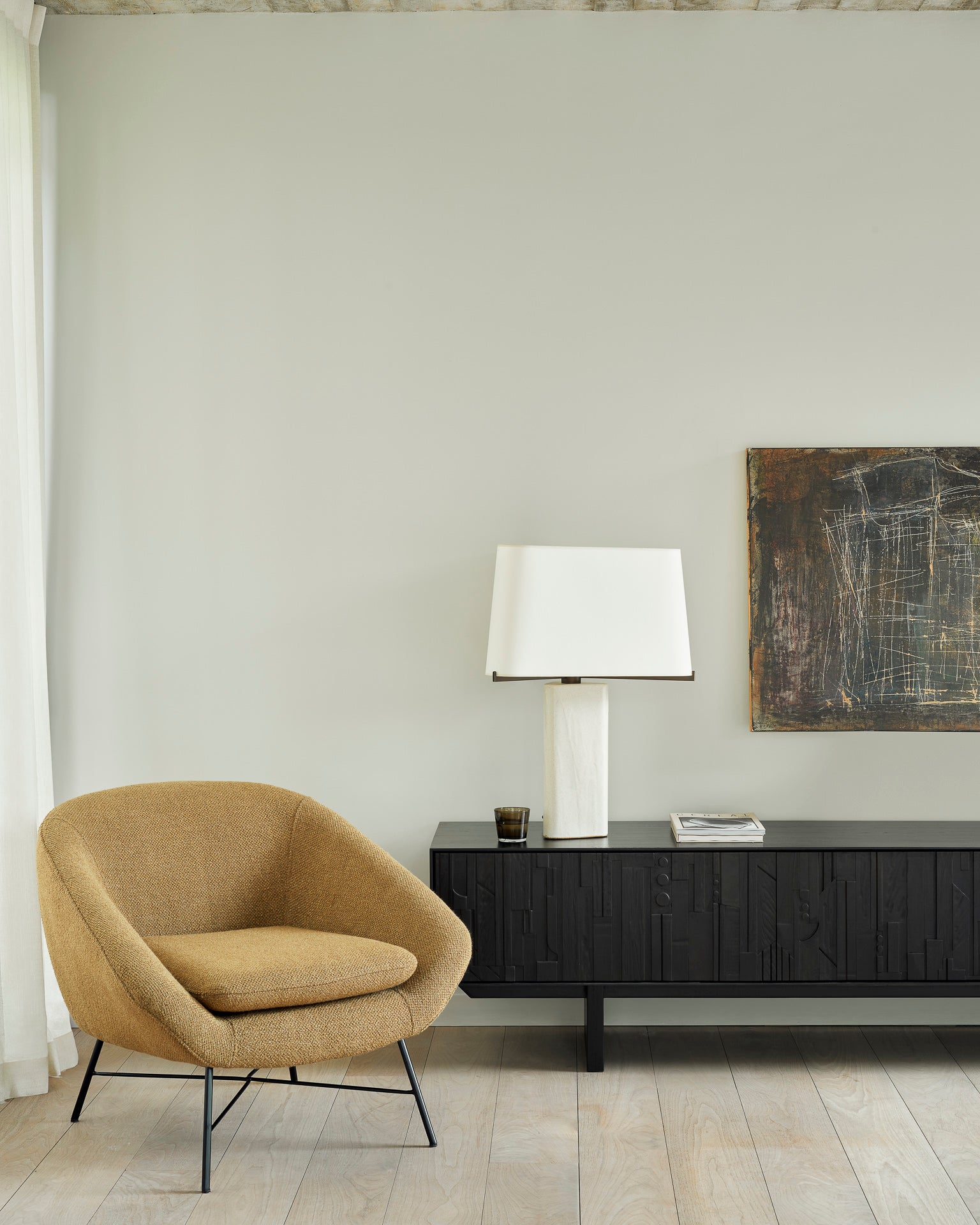 Ethnicraft Barrow loungestoel ginger sfeerbeeld.