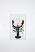 StigerWoods wooden tile Oosterschelde Lobster on White Table