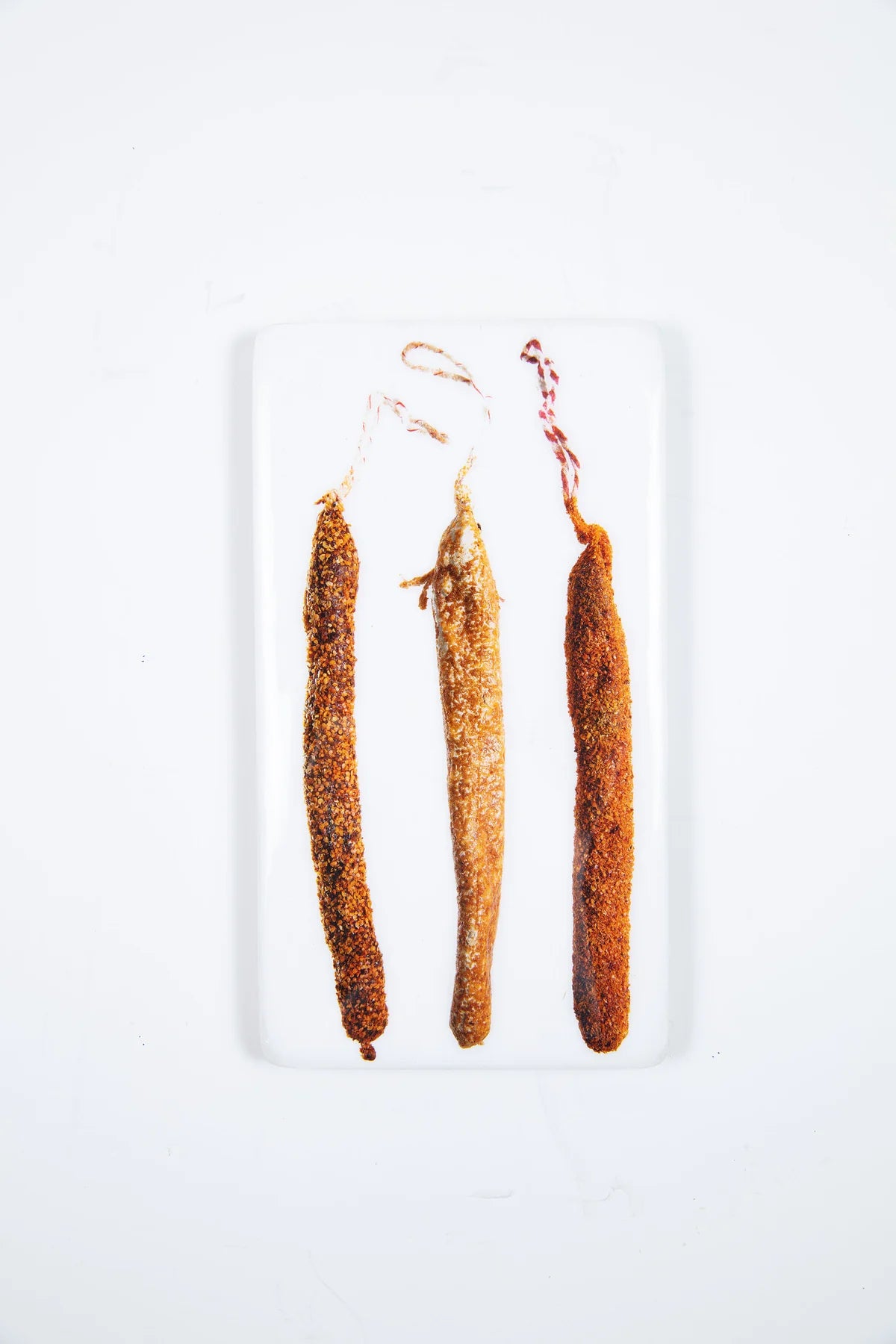 StigerWoods wooden tile Three Mallorcian Sausages