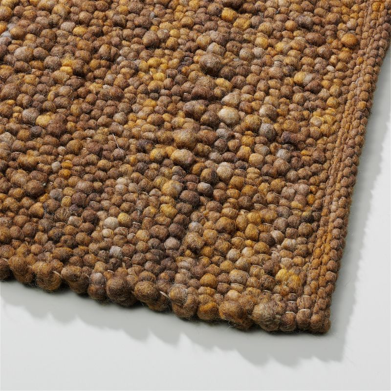 Perletta vloerkleed Pebbles in de kleur Bronze 462.