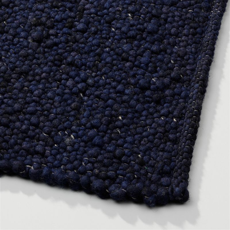 Perletta vloerkleed Pebbles in de kleur Navy 059.