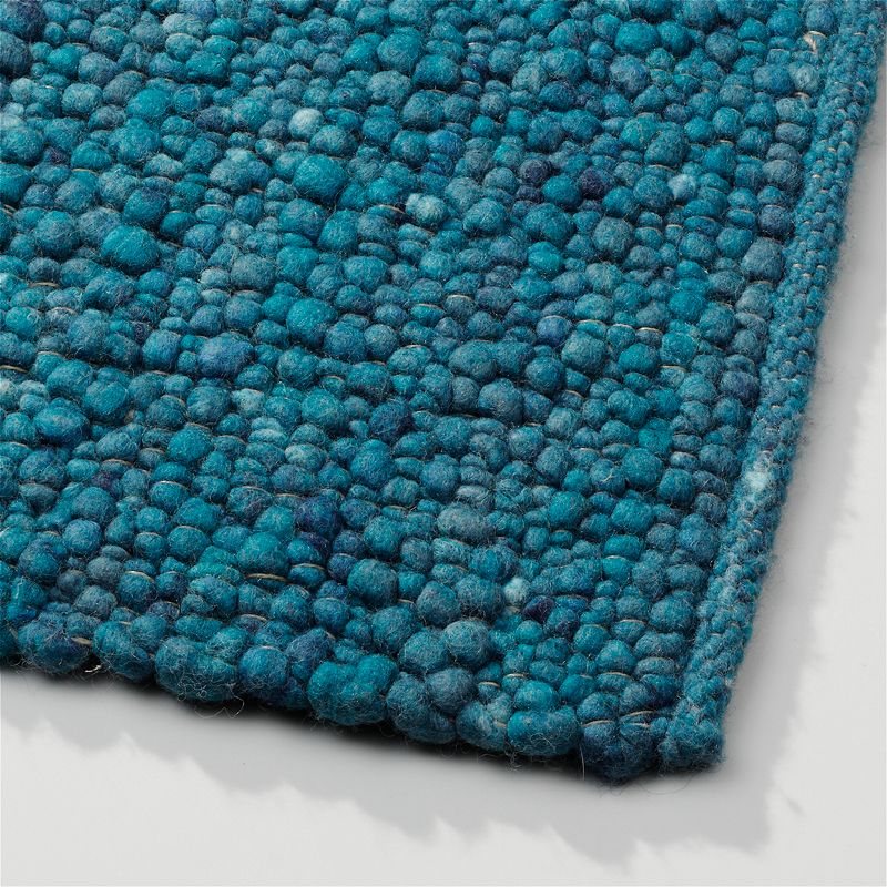 Perletta vloerkleed Pebbles in de kleur Petrol 154.