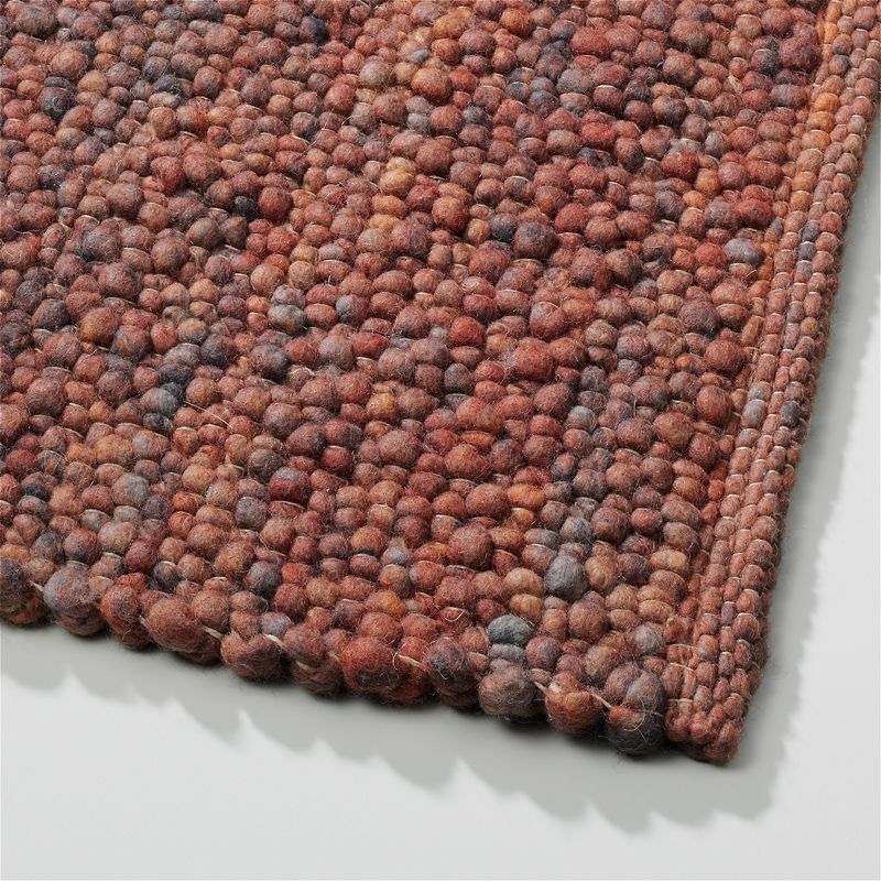 Perletta vloerkleed Pebbles in de kleur Rust 425.