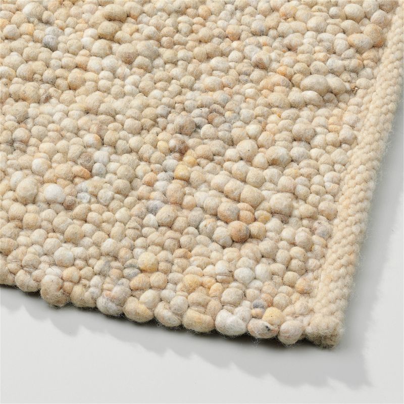 Perletta vloerkleed Pebbles in de kleur Sand 124.