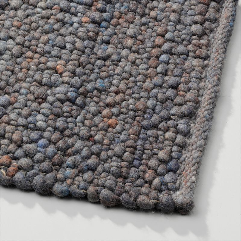 Perletta vloerkleed Pebbles in de kleur Sky 058.