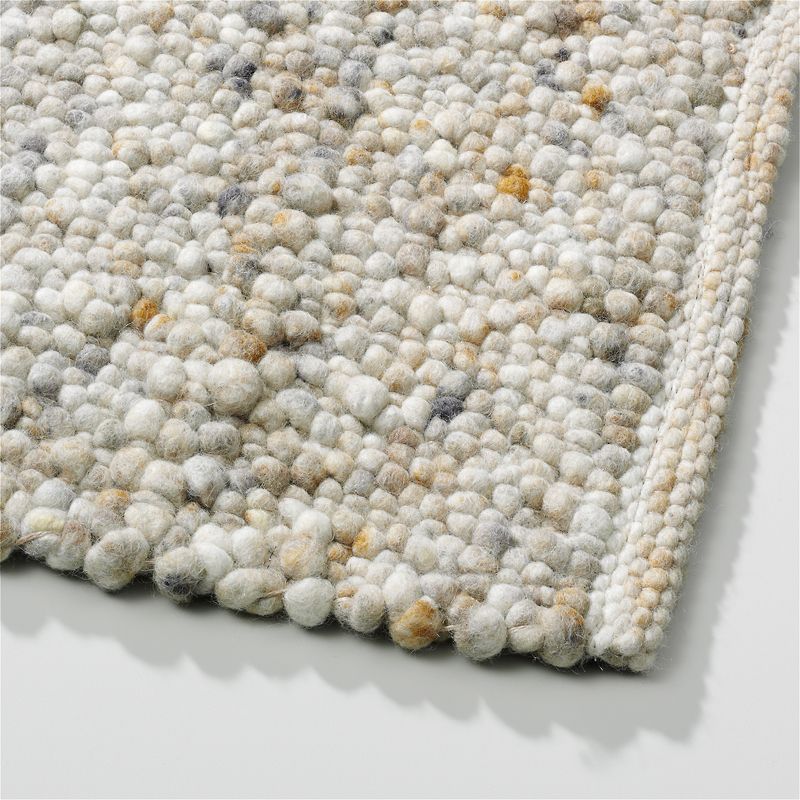 Perletta vloerkleed Pebbles in de kleur Straw 464.
