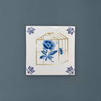 Royal Delft Goldie Tiles - Uit de kas met achtergrond