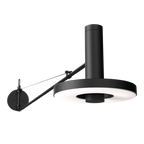 Close-up van de Tonone Beads Wall 120 wandlamp in de kleur smokey black.