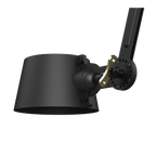 Close-up van de kap van de Tonone Bolt Ceiling 1 arm Sidefit plafondlamp in de kleur smokey black.